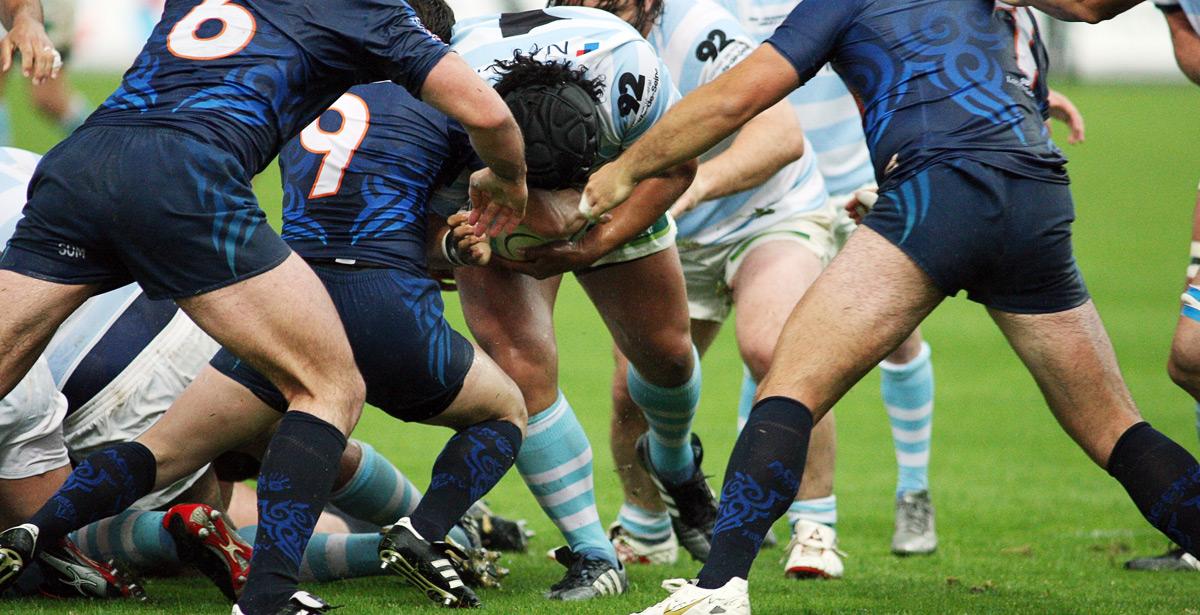 Rugby azione in mischia - Foto di milphoto da Adobe Stock